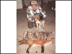 Joe Lane with 9 Rabbits and a Red Fox